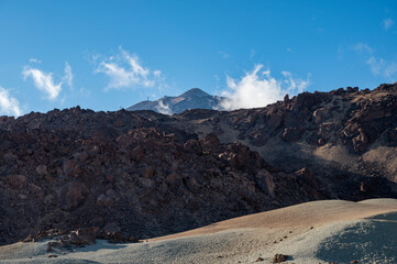 Visiting Teide national park on Tenerife and view on volcanic landscapes, Canary islands, Spain