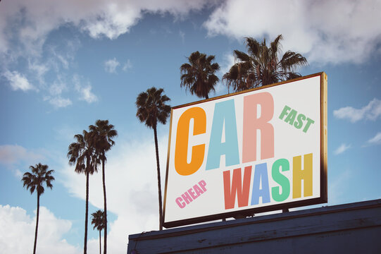 Retro vintage car wash sign with palm trees