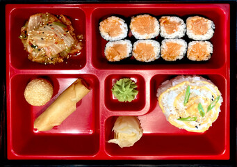 sushi set with rolls, rice and salad