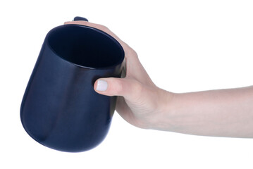 Black cup mug in hand on white background isolation