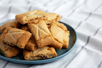 Homemade Organic Apple Pie Cookies on a Plate, side view. Space for text.