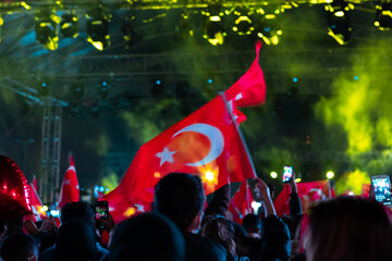 Naklejka premium Waving Turkish Flags in a celebration at night. National days of Turkey