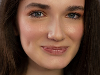 Obraz premium Close-up beauty woman with clean shiny skin and natural cosmetics. Fashion, spa, cosmetology, lip injections, eyeshadow on brown eyes and thick eyebrows, cosmetics, make-up, beautiful
