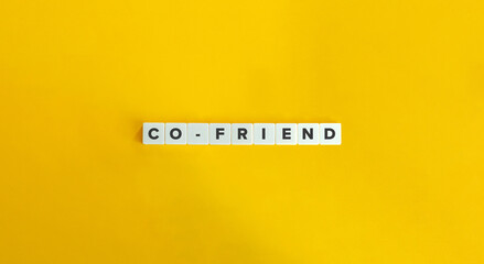 Co-friend Urban Word on Letter Tiles on Yellow Background. Minimal Aesthetics.