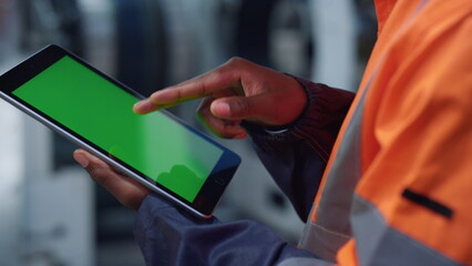 Chroma key screen hands tapping tablet computer. Modern specialist concept.