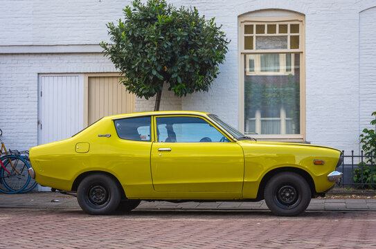 Breda, North Brabant, The Netherlands, 19.05.2022, Side view of vintage car Datsun 120 Y Deluxe  from year 1976