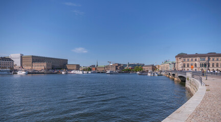 Bay view with commuting boats and cultural buildings a sunny day in Stockholm