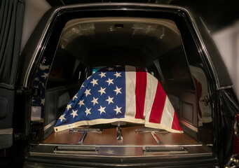 flag draped casket in hearse - obrazy, fototapety, plakaty