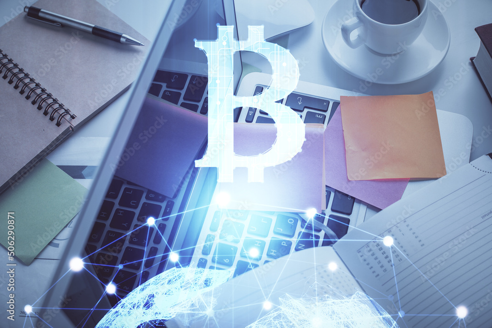 Poster Blockchain theme hologram drawings over computer on the desktop background. Top view. Multi exposure. Concept of cryptoeconomy.