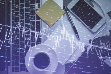 Double exposure of financial chart drawing over table background with computer. Concept of research and analysis. Top view.