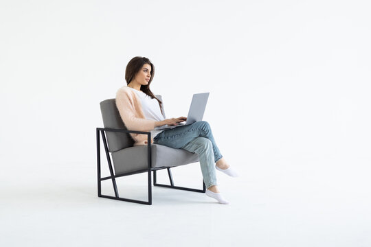 Young Business Woman With Laptop Isolated On White