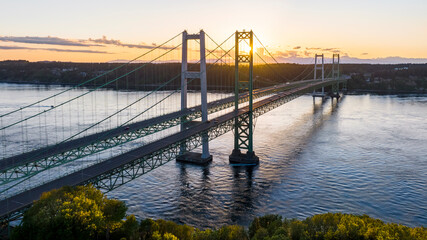 Aerial view of the Narrows bridge in Tacoma Washington with the sun setting