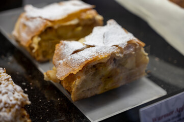 Austrian desserts, different types of chocolate and fruit cakes in cafe in Vienna, apple strudel.