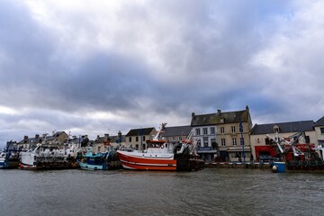 Fototapeta na wymiar Fishing boats in the harbor of Port en Bessin in Normandy, France