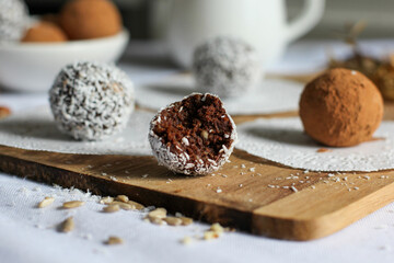 Vegan chocolate balls made from medjool dates, cocoa, desiccated coconut, sunflower seeds and grain...