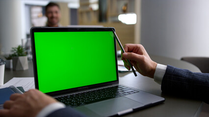 Office employee using laptop chroma key working on business team conference.