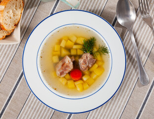 Delicious thick rustic style soup cooked in meat stock with pork and vegetables.