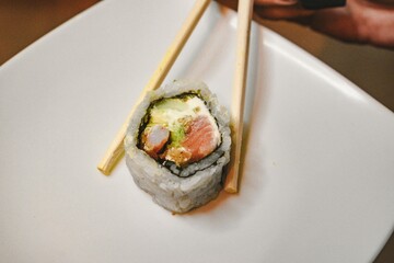 sushi with chopsticks