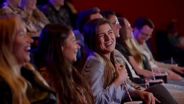 Great emotions in a movie theater while watching a film - people photography in a cinema