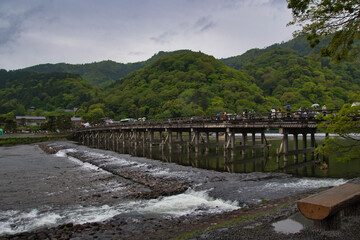 Fototapeta na wymiar The Togetsu-kyou bridge across the Ohi river. Arashiyama Kyoto Japan 