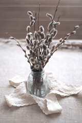 Willow. Still-life. A bouquet of willow. Willow branches. Candles. Candlesticks. © Андрей Нетишин