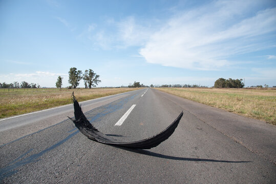 Blown retreated truck tires on highway