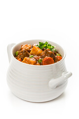 Beef Stew with Potatoes and Carrots made in a Slow Cooker Isolated on White. Selective focus.