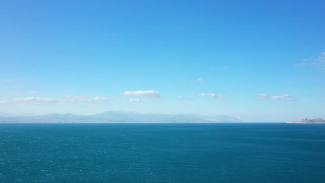 The Ionian Sea in Europe, Greece, Peloponnese, Corinthia in summer on a sunny day.