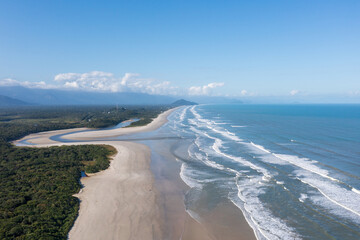 Fototapeta na wymiar Aerial image of the meeting between Rio and the Sea. Environmental reserve, beautiful and empty beach