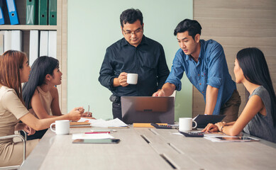 Group of business people meeting in conference room brainstorming consult business document graph chart office desk. Diversity multiethnic group of business people brainstorming and working together.