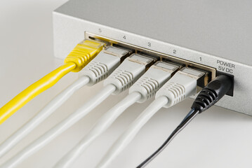 Small router and switch. tcp ip network business concept. High - performance gigabit switch. home network gray switch.