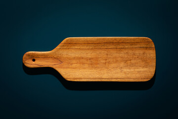Cutting board isolated on black background. Long wooden pallets on black background.