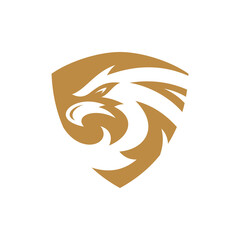 Bird head silhouette and shield logo design. Eagle, falcon or hawk badge emblem vector icon