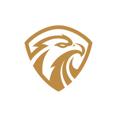 Eagle and shield logo design. Bird, falcon or hawk head badge emblem vector icon