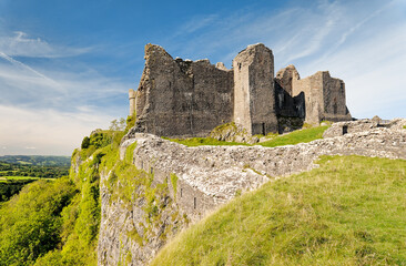 Fototapeta na wymiar Carreg Cennen castle, near Llandeilo, Wales, UK. Brecon Beacons National Park. East front. Limestone escarpment. Late Mediaeval