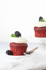 cupcake with berries and mint
