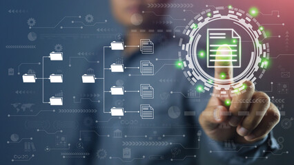 A Business man pointing or click document management system or DMS online documentation database on the hybrid cloud. efficiency on document arrangement in the organization data using availability.