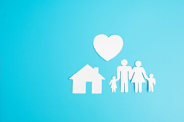 Happy Family day. paper shape cutout with Father, Mother, Children, Home and Heart. international day of families, Warm home, love, Insurance, Life and Wellness concepts.