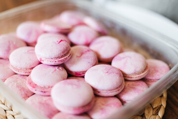 Bakery. Decoration of confectionery. Making macaroons. Pink macaroons. Biscuit