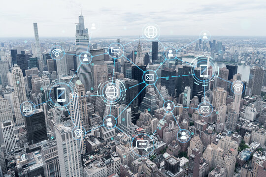 Aerial panoramic city view of Upper Manhattan, the East Side, river and Brooklyn on horizon, New York city, USA. Social media hologram. Concept of networking and establishing new people connections