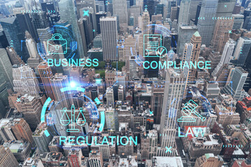 Aerial panoramic roof top city view of New York Financial Downtown district at day time. Manhattan, NYC, USA. Glowing hologram legal icons. The concept of law, order, regulations and digital justice