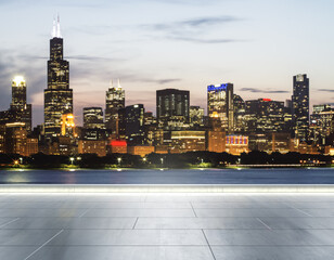 Empty concrete embankment on the background of a beautiful blurry Chicago city skyline at evening, mockup
