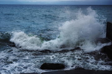 Storm at sea. Sea view with waves during rain and cloudy in Alupka. Crimea