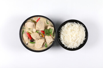 Tom Kha Gai. Thai chicken coconut soup in a bowl and rice in a bowl. isolated on a white background top view have copy space.
