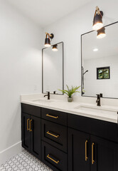 Beautiful bathroom in new luxury home. Features double vanity (two sinks) with faucet, sink,...