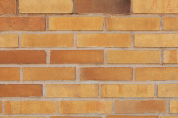 Texture of beige brick wall as background