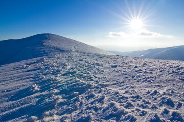 Amazing winter snowy scenery of famous and popular touristic landmark - old desolate observatory on...