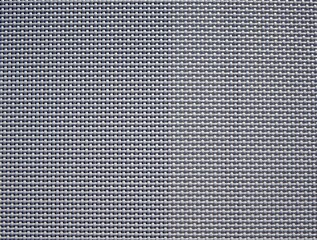 Gray textilene in close up. Garden furniture material. Background of waterproof textilene.