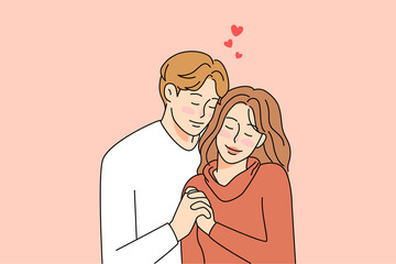 Happy young couple hug enjoy romantic connection 