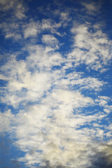 High clouds in the summer sky. Sky background. Meteorological observations of the sky.
